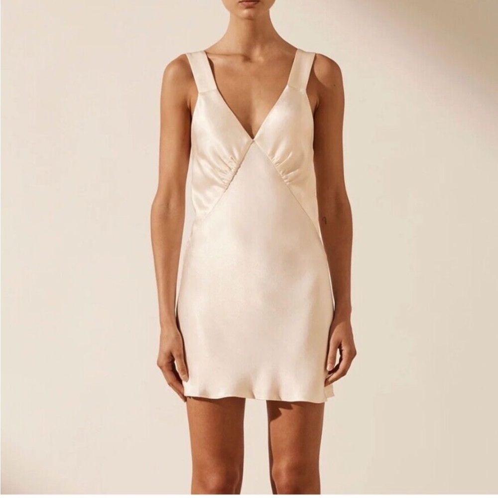 Rumored Cream Sleeveless Dress